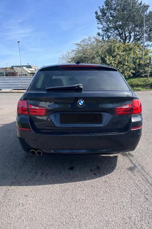 Gebraucht BMW 520 184 PS (135 kW) 2012 Schwarz Kombi