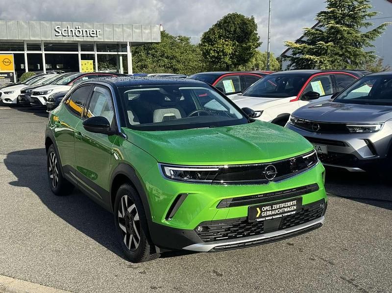 Gebraucht Opel Mokka Elegance 131 PS (96 kW) 2023 Matcha grün SUV
