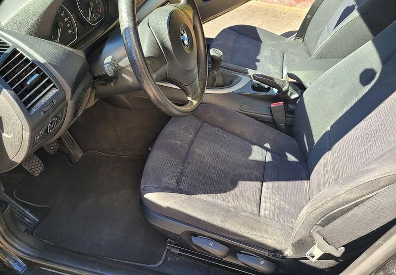 Brugt BMW 116 122 HK (89 kW) 2010 Sort Hatchback