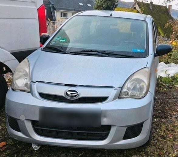 Gebraucht Daihatsu Cuore 60 PS (44 kW) 2010 Silber Kleinwagen