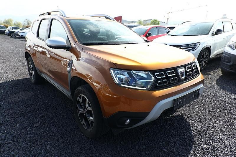 Używany Dacia Duster Prestige 101 KM (74 kW) 2021 Pomarańczowy SUV