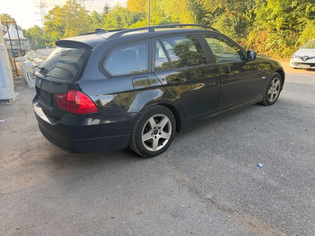 Gebraucht BMW 318 143 PS (105 kW) 2009 Schwarz Kombi
