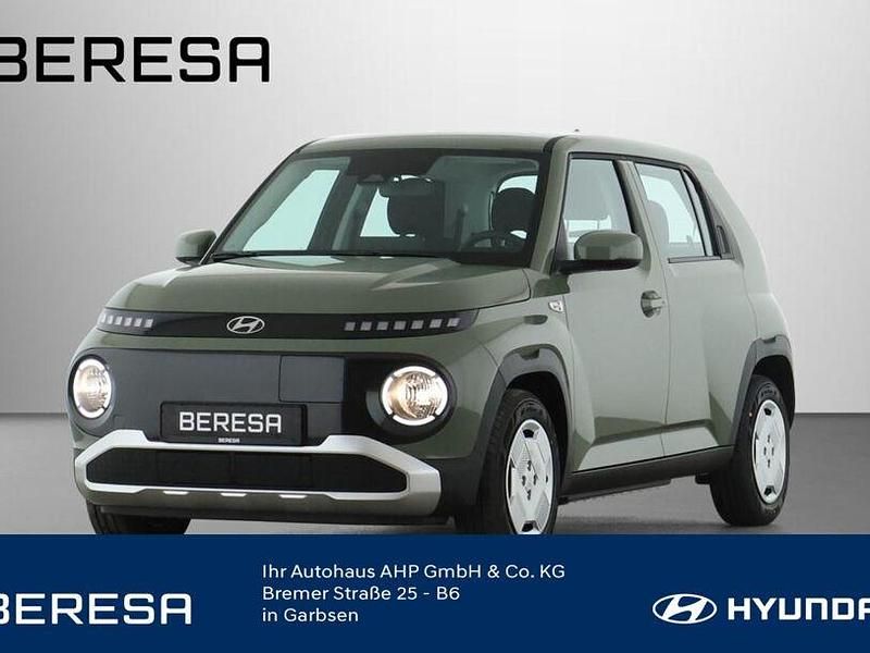 Tomboy khaki Neu 2025 Hyundai Inster Select Kleinwagen | 23.480 € (Superpreis) - Bild 1/4