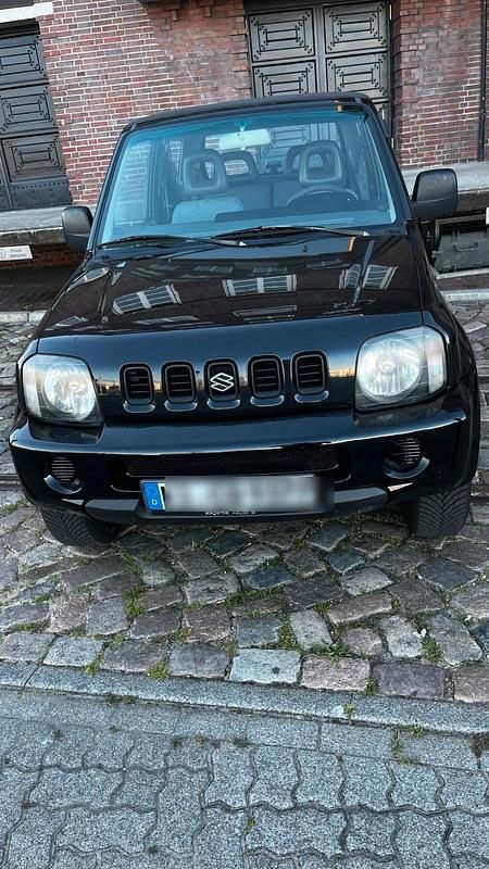 Schwarz Gebraucht 2001 Suzuki Jimny SUV | 4.998 € - Bild 1/4