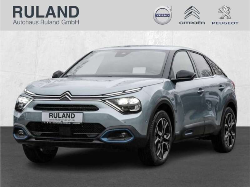Lackierung olbia blau/typ auss Gebraucht 2024 Citroën e-C4 Shine Limousine | 25.990 € (Fairer Preis) - Bild 1/4