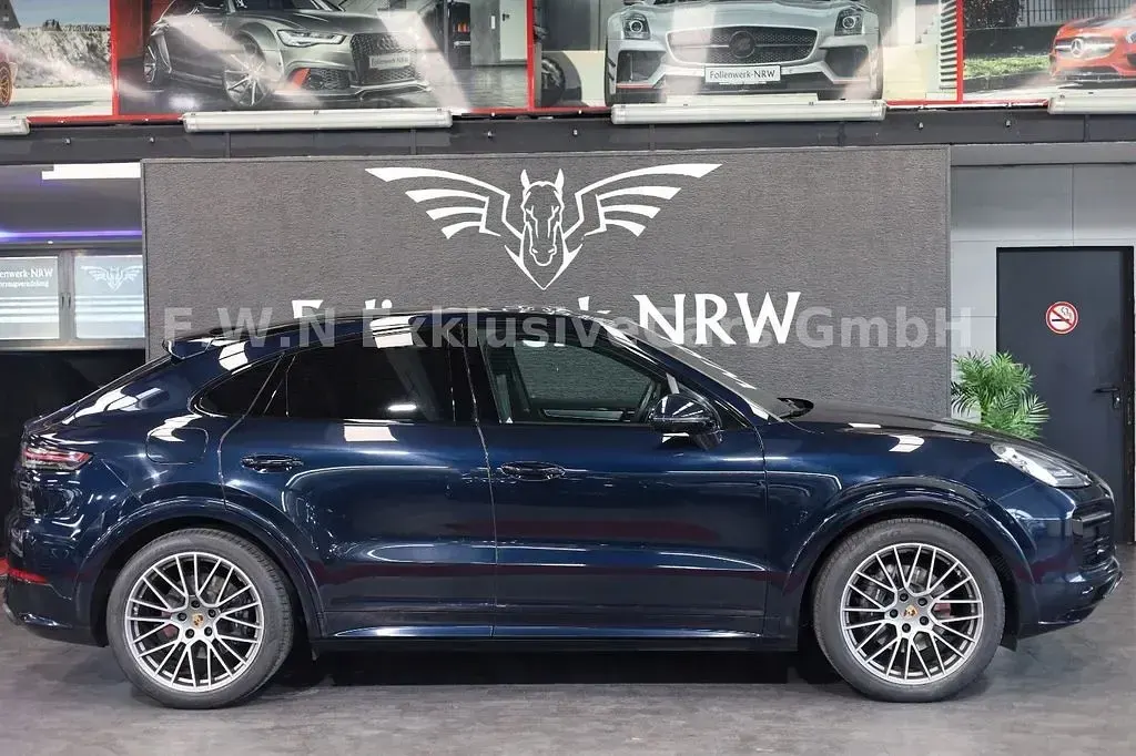 Gebraucht Porsche Cayenne E-Hybrid Coupe Platinum Edition 462 PS (339 kW) 2023 Blau SUV