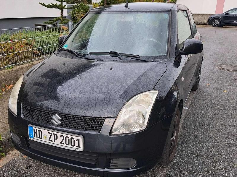 Schwarz Gebraucht 2006 Suzuki Swift Comfort+ Limousine | 3.350 € (Fairer Preis) - Bild 1/4
