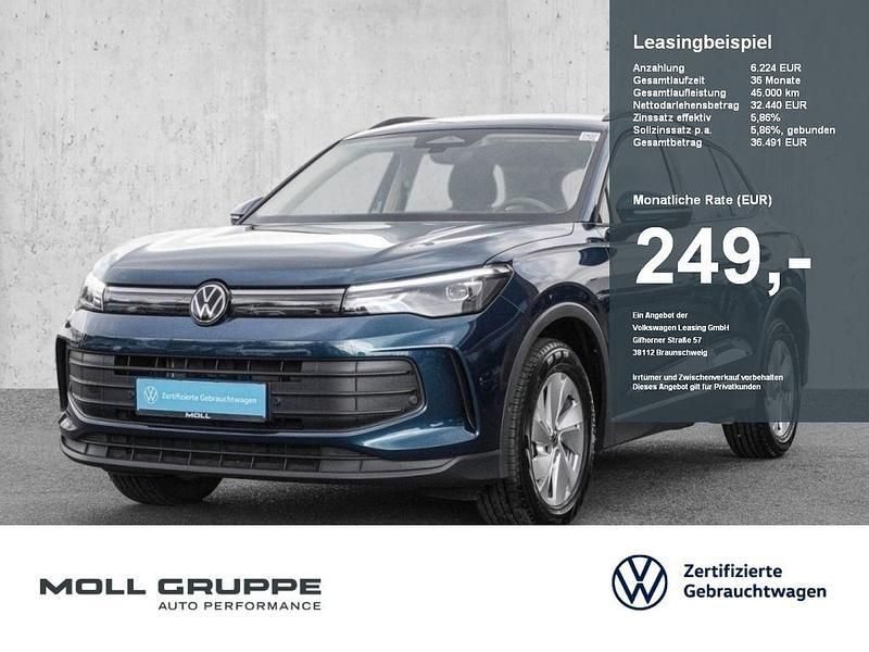 Nightshade blue metallic Gebraucht 2024 VW Tiguan Basis SUV | 32.440 € (Superpreis) - Bild 1/4
