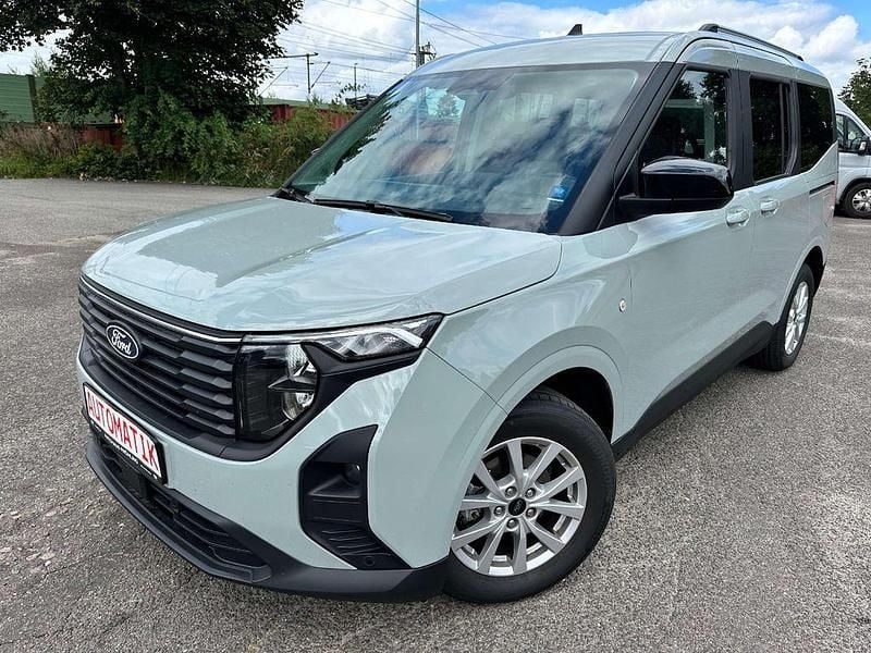 Cactus gray Gebraucht 2024 Ford Tourneo Courier Titanium Van / Kleinbus | 24.900 € (Guter Preis) - Bild 1/4