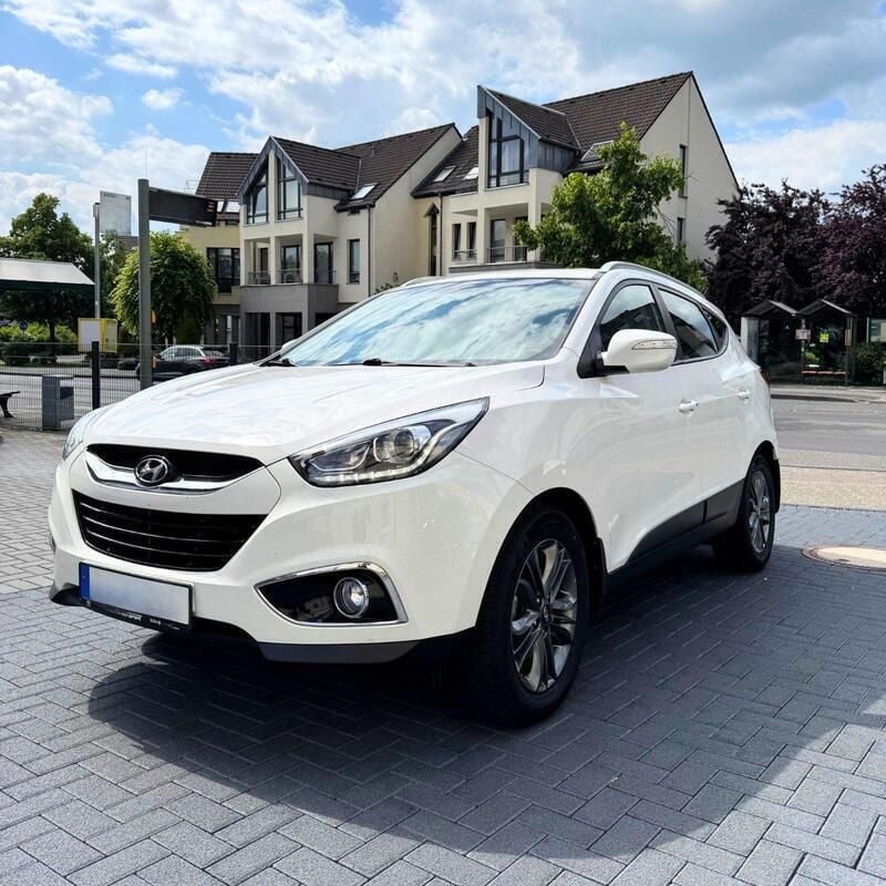 Weiß Gebraucht 2014 Hyundai Tucson Trend SUV | 15.200 € - Bild 1/4
