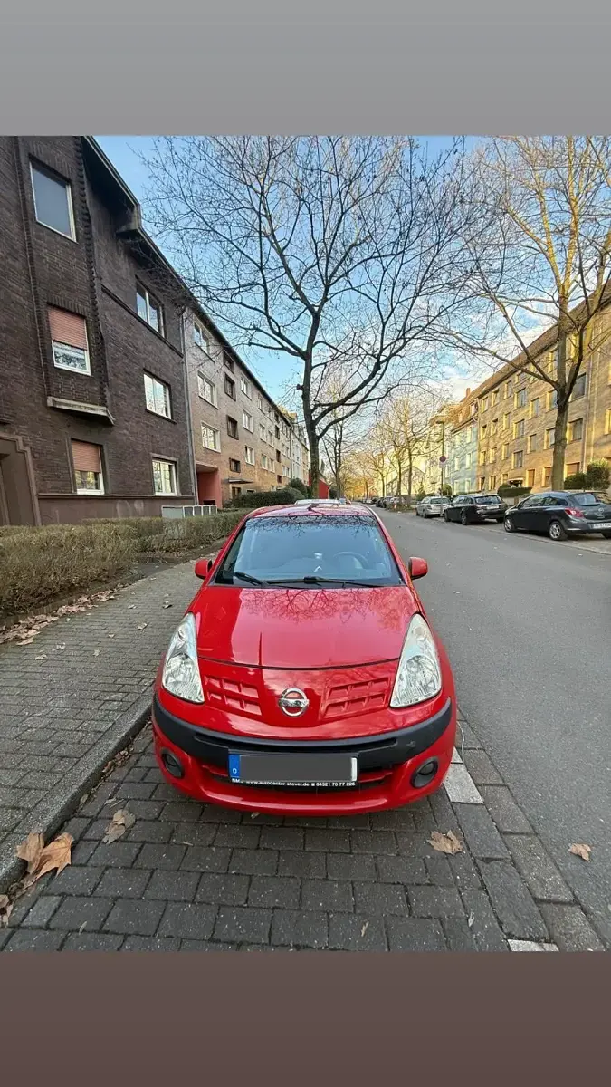 Gebraucht Nissan Pixo 68 PS (50 kW) 2012 Rot Kleinwagen