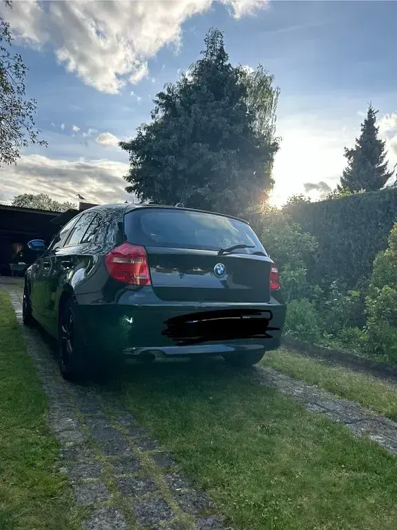 Gebraucht BMW 116 122 PS (89 kW) 2009 Schwarz Kleinwagen