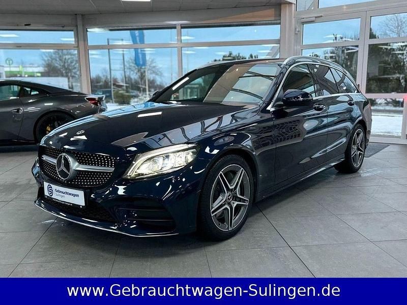 Blau Gebraucht 2019 Mercedes C300 AMG line Limousine | 29.895 € (Superpreis) - Bild 1/4