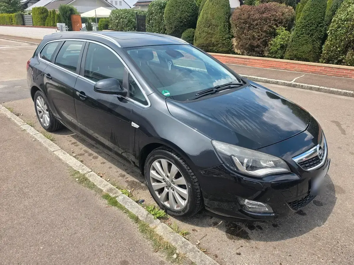 Gebraucht Opel Astra 165 PS (121 kW) 2011 Schwarz Kombi