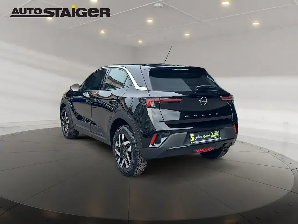 Gebraucht Opel Mokka Elegance 101 PS (74 kW) 2024 Lackierung schwarz perla nera/ SUV