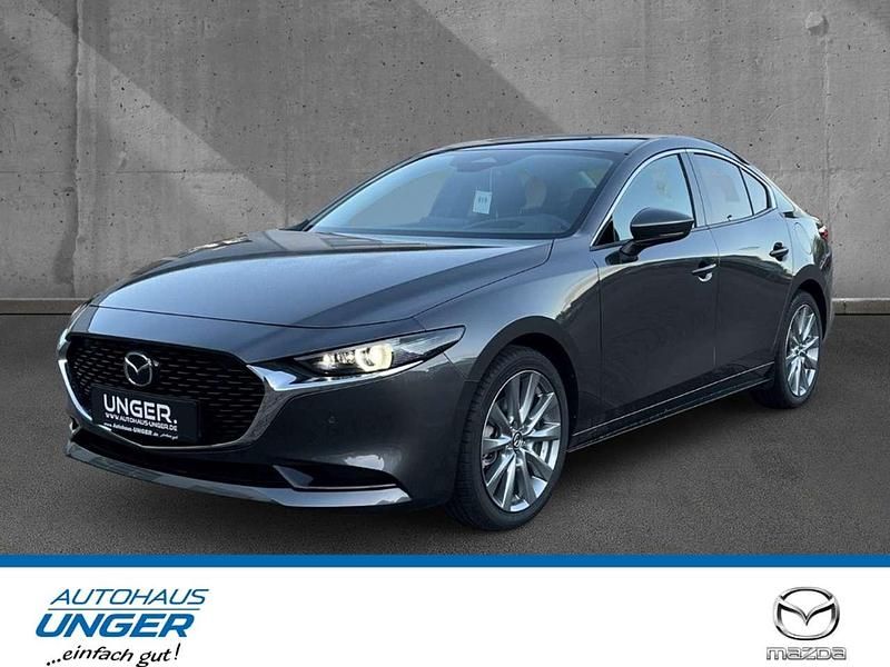 Machine grey Neu 2025 Mazda 3 Exclusive-Line Limousine | 29.290 € - Bild 1/4