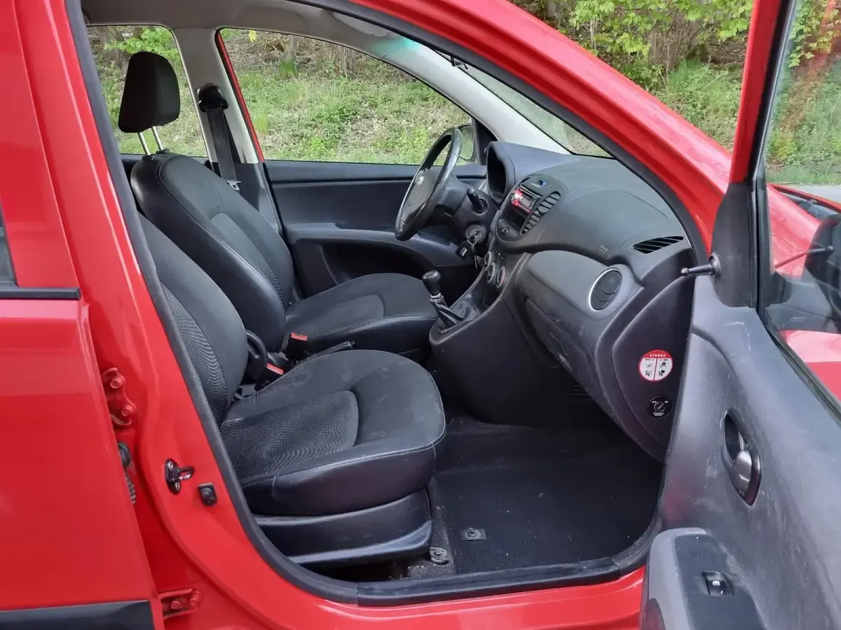 Gebraucht Hyundai i10 69 PS (50 kW) 2013 Rot Kleinwagen