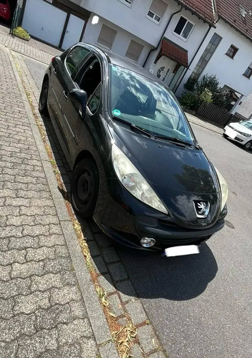 Gebraucht Peugeot 207 73 PS (53 kW) 2009 Schwarz Kleinwagen
