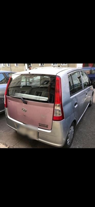 Gebraucht Daihatsu Cuore 58 PS (42 kW) 2004 Silber Kleinwagen