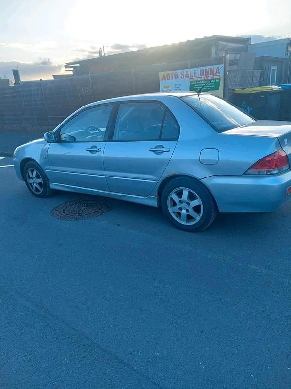 Gebraucht Mitsubishi Lancer 98 PS (72 kW) 2003 Silber Limousine