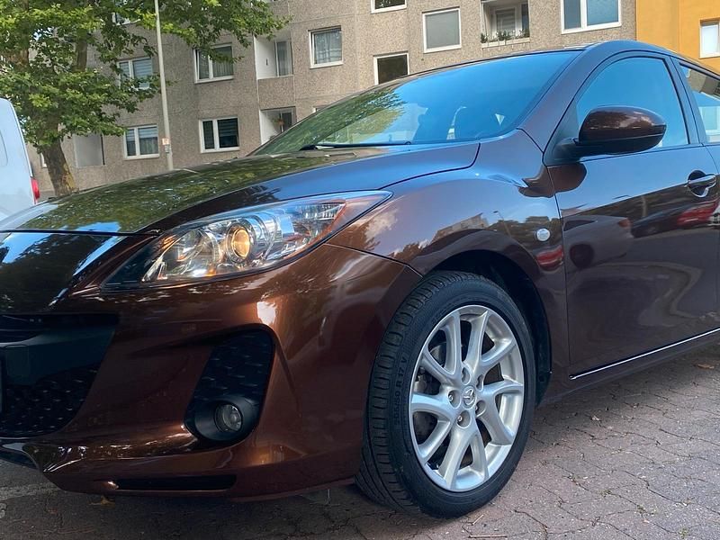 Braun Gebraucht 2012 Mazda 3 Edition Limousine | 5.390 € (Fairer Preis) - Bild 1/4