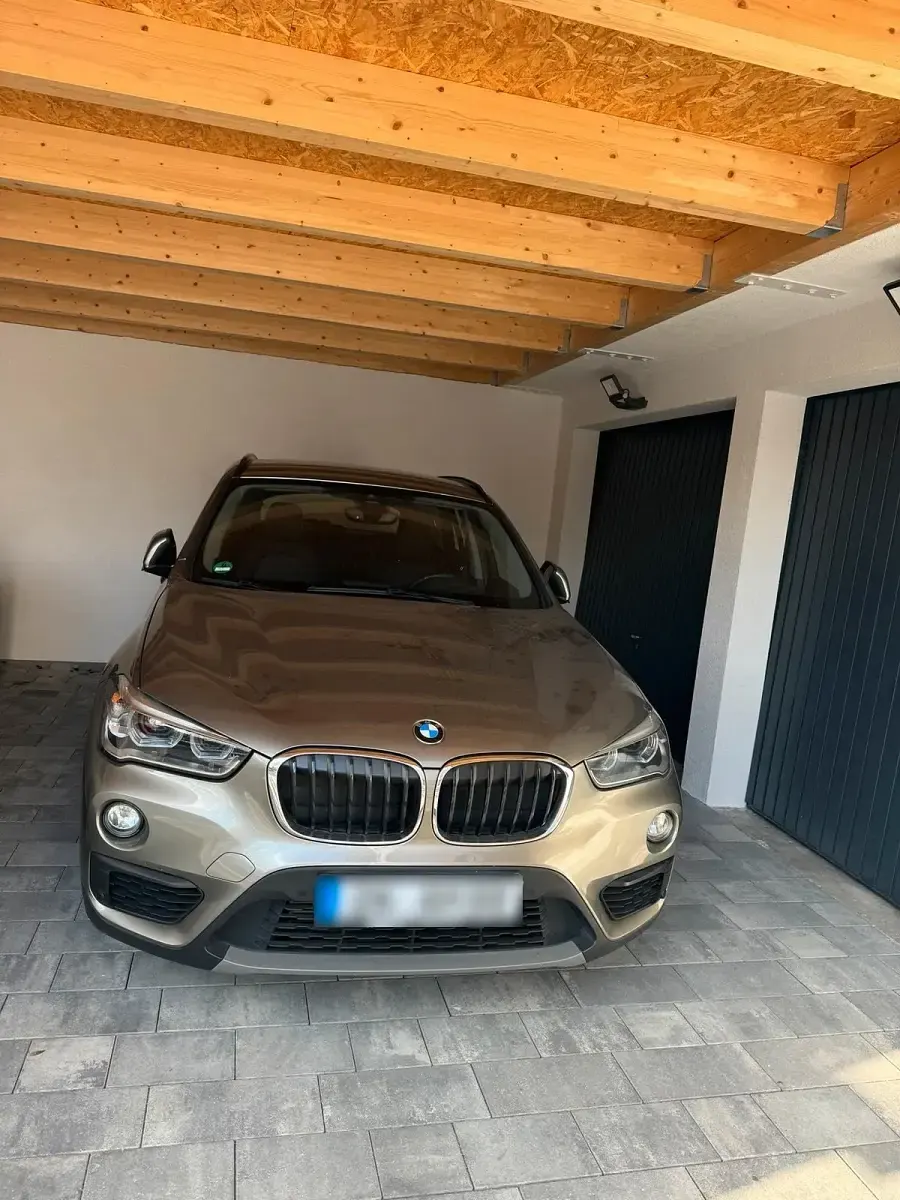 Używany BMW X1 150 KM (110 kW) 2016 Brązowy SUV