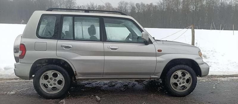 Silber Gebraucht 2004 Mitsubishi Pajero Motion SUV | 2.750 € (Fairer Preis) - Bild 1/4