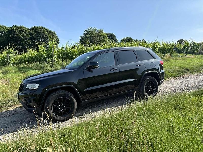 Schwarz Gebraucht 2016 Jeep Grand Cherokee SUV | 23.999 € (Fairer Preis) - Bild 1/4