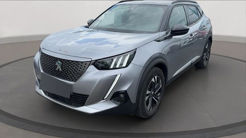 Grau Gebraucht 2021 Peugeot e-2008 GT SUV | 20.749 € (Teuer) - Bild 1/4