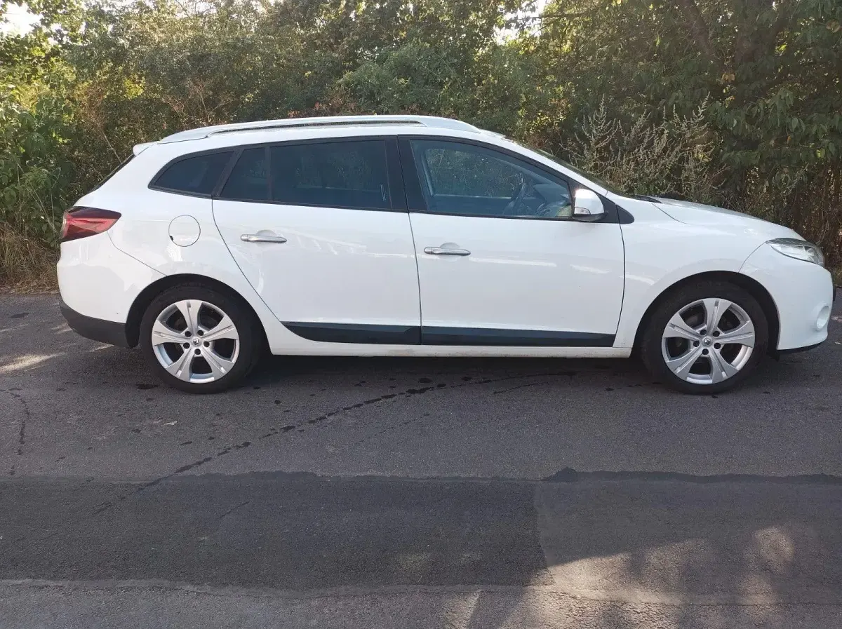 Gebraucht Renault Mégane GrandTour 106 PS (77 kW) 2009 Weiß Kombi