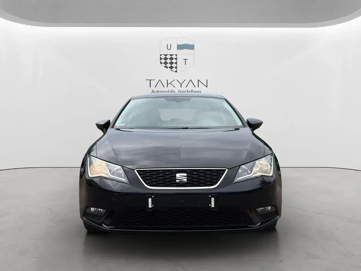 Używany Seat Leon Style 105 KM (77 kW) 2014 Czarny Kombi