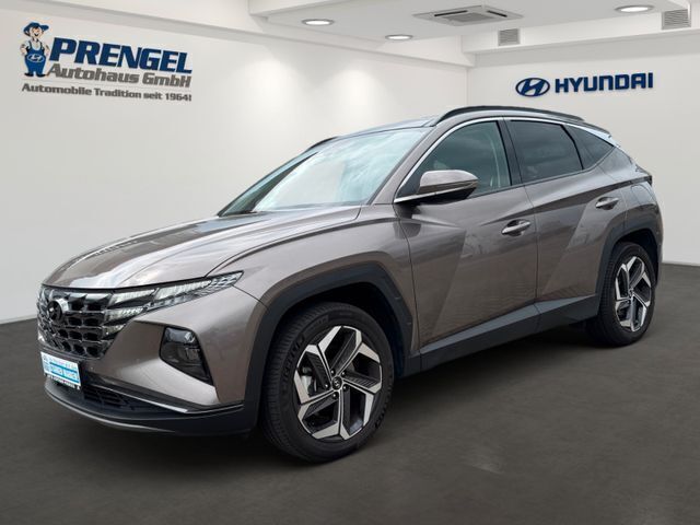 Silky bronze / met Gebraucht 2024 Hyundai Tucson Trend SUV | 33.650 € - Bild 1/4
