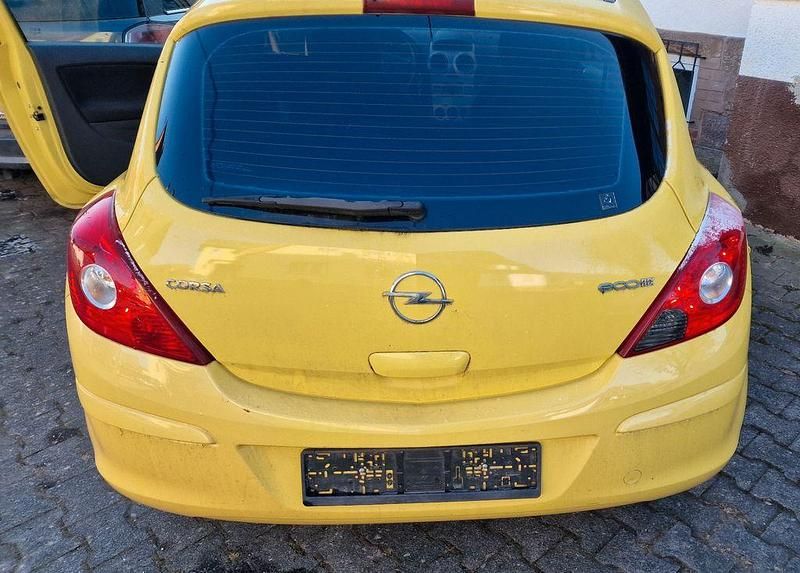 Gebraucht Opel Corsa 60 PS (44 kW) 2010 Gelb Kleinwagen