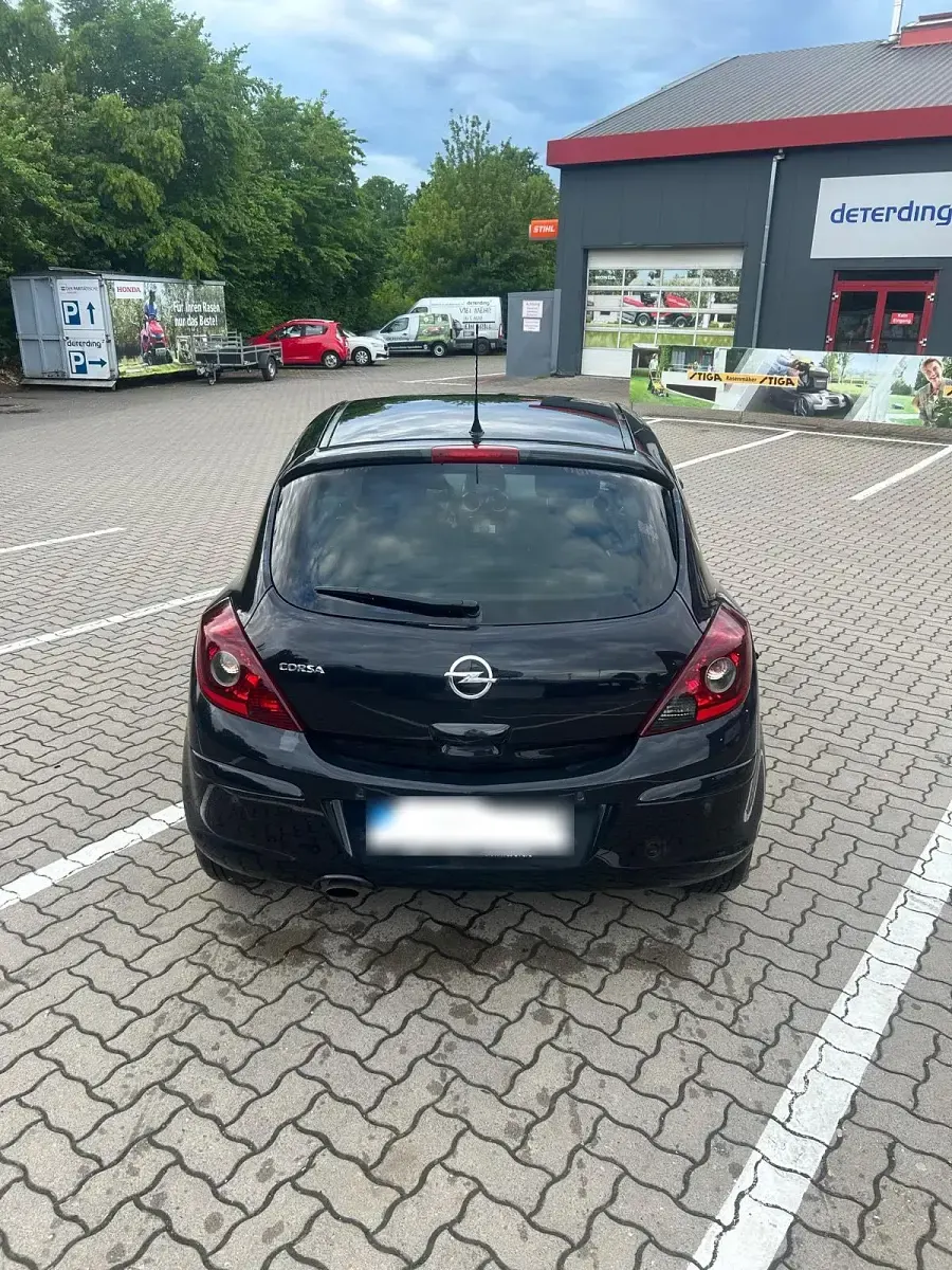 Gebraucht Opel Corsa 78 PS (57 kW) 2011 Schwarz Kleinwagen