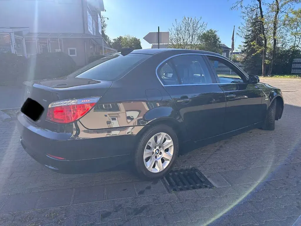 Second-hand BMW 520 163 CP (119 kW) 2009 Negru Berlinǎ