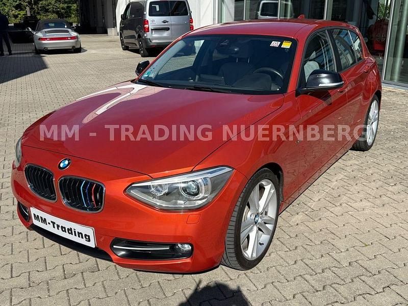 Orange Gebraucht 2012 BMW 120 Sport Line Kleinwagen | 10.999 € (Fairer Preis) - Bild 1/4