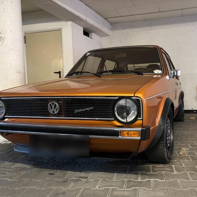 Second-hand VW Golf I GTI 75 CP (55 kW) 1976 Auriu Hatchback