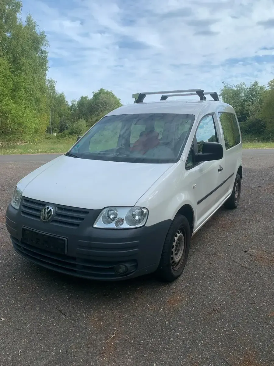 Używany VW Caddy 105 KM (77 kW) 2004 Biały Minivan