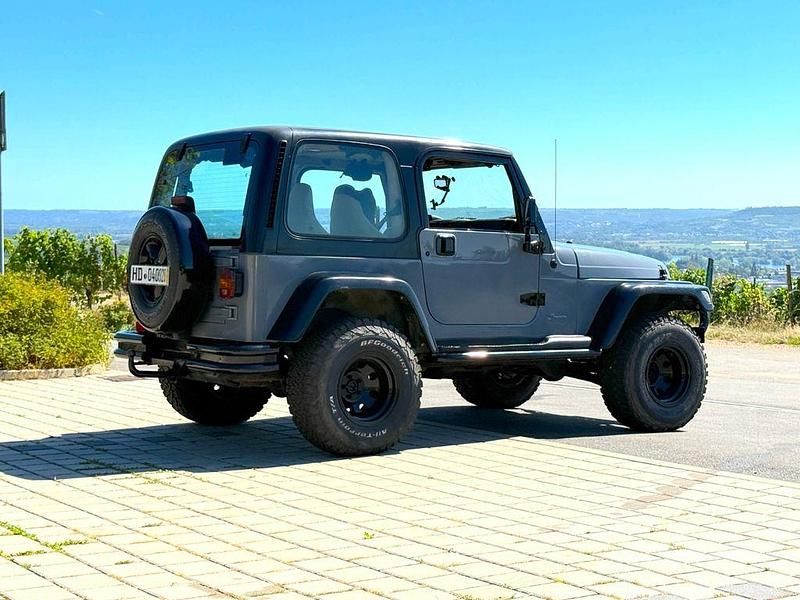 Grau Gebraucht 1997 Jeep Wrangler Sahara SUV | 13.900 € (Guter Preis) - Bild 1/4