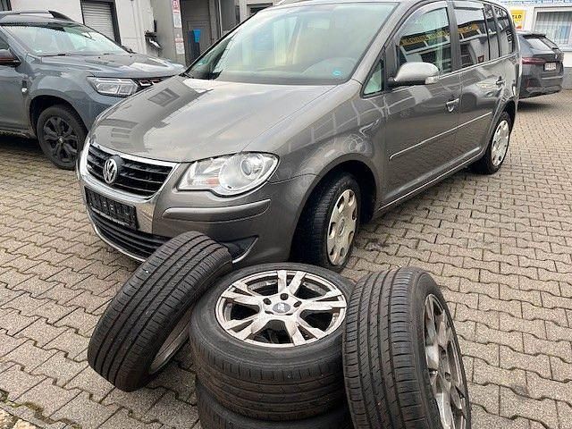 Gebraucht VW Touran 140 PS (102 kW) 2007 Braun Van / Kleinbus