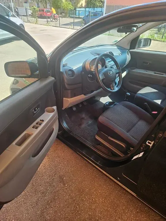 Gebraucht Daihatsu Sirion 69 PS (50 kW) 2007 Schwarz Kleinwagen