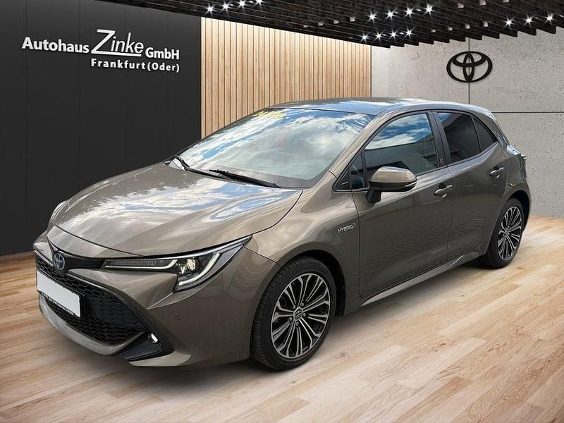 Grün Gebraucht 2020 Toyota Corolla Hybrid Team Limousine | 22.200 € (Etwas zu teuer) - Bild 1/4