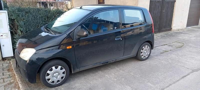 Gebraucht Daihatsu Cuore 58 PS (42 kW) 2005 Schwarz Kleinwagen