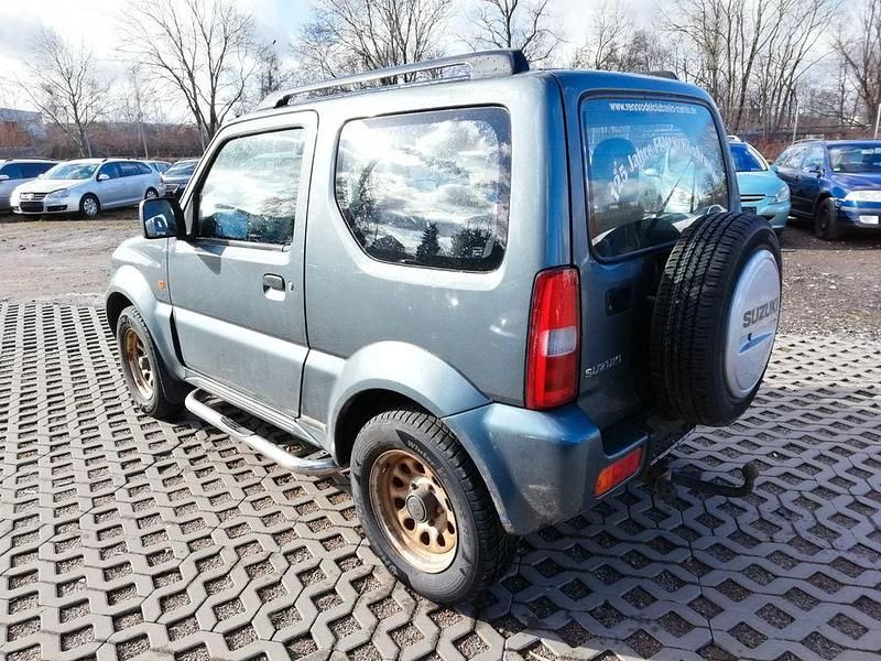 Grau Gebraucht 2007 Suzuki Jimny Club SUV | 3.900 € - Bild 1/4