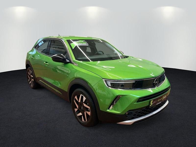 Gebraucht Opel Mokka-e Elegance 100 kW (136 PS) 2022 Matcha green/ikone gruen SUV