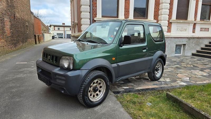Grün Gebraucht 2009 Suzuki Jimny SUV | 2.950 € (Superpreis) - Bild 1/4