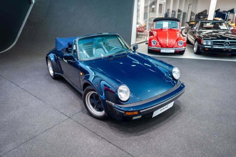 Porsche dunkelblau uni Gebraucht 1986 Porsche 911 Cabrio | 99.911 € - Bild 1/4