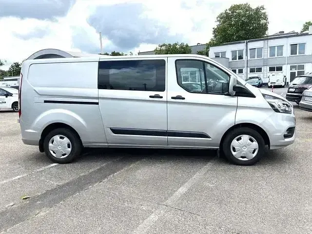 Gebraucht Ford Transit Custom Trend 131 PS (96 kW) 2020 Moondust silver (metallic) Pickup