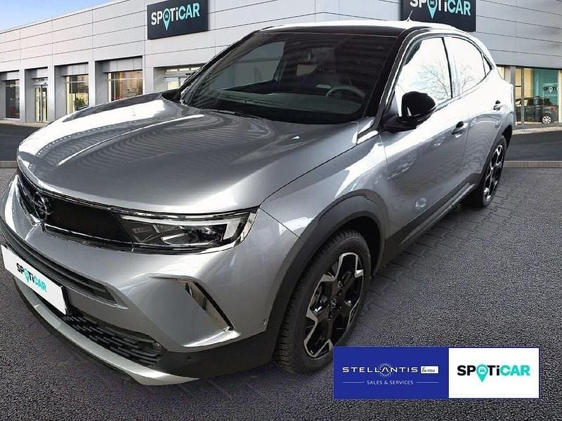 Grau Gebraucht 2023 Opel Mokka-e Ultimate SUV | 19.870 € (Fairer Preis) - Bild 1/4