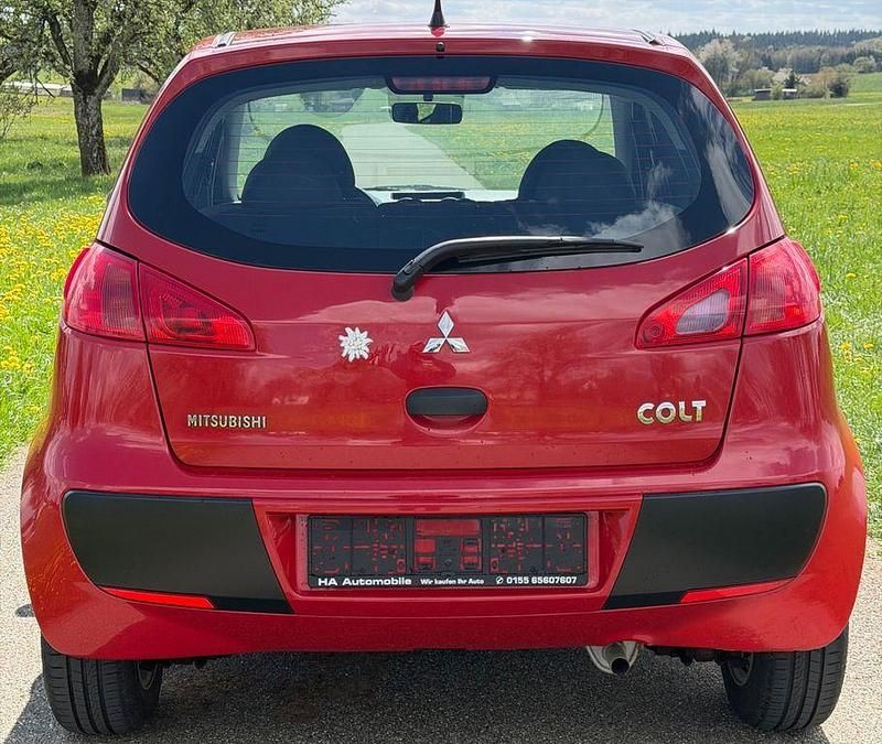 Second-hand Mitsubishi Colt Inform 75 CP (55 kW) 2008 Roșu Berlinǎ